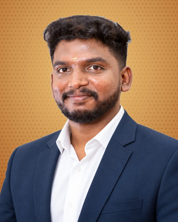 Photo of Karthik Raja V in a navy suit